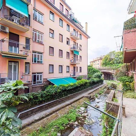 Апартаменты Joivy Bright 2-bedroom Flat With Terrace Near The Рапалло